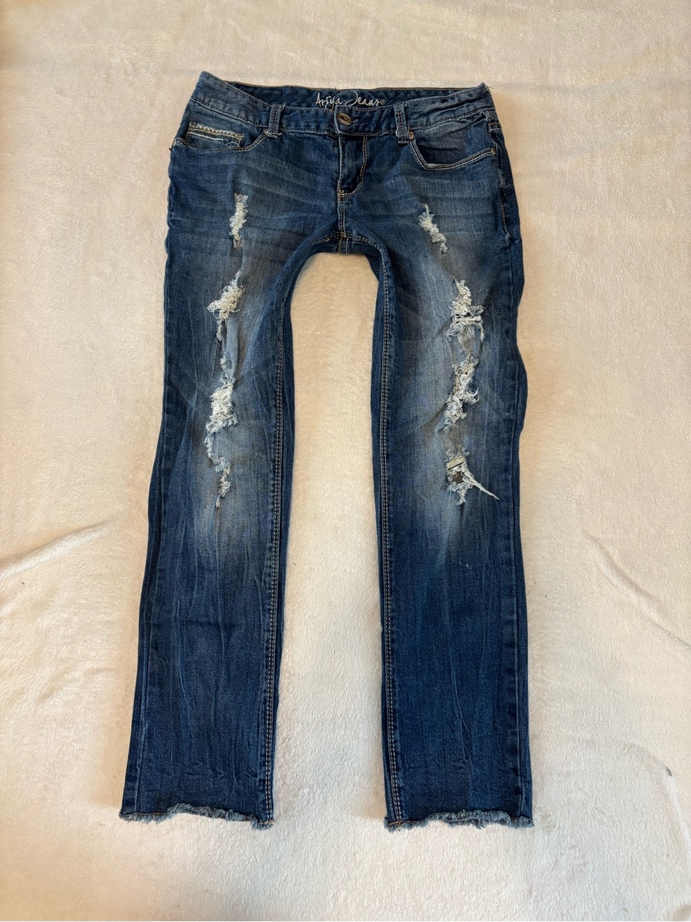 Ariya low rise Medium-Dark Blue Distressed Bootcut Jeans